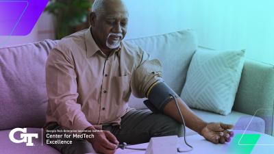 man with blood pressure cuff