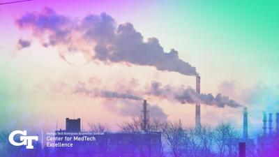 distance shot of factory and smoke stacks